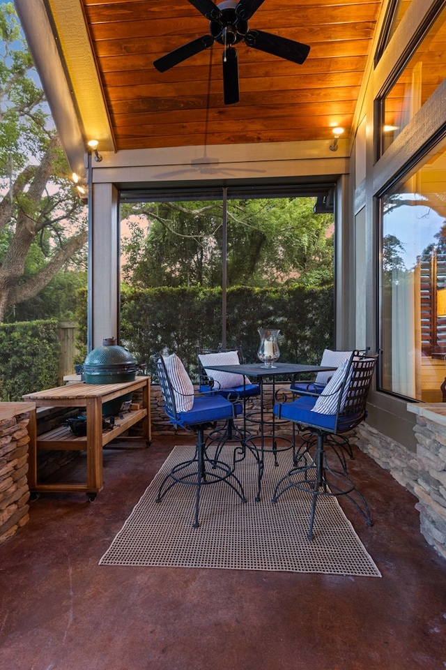 view of patio featuring ceiling fan