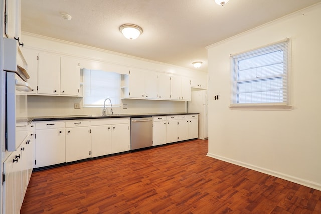 kitchen featuring sink, white cabinets, crown molding, dark wood-type flooring, and white appliances