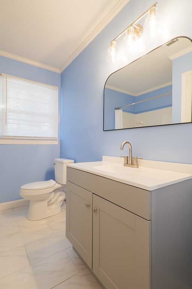 bathroom with ornamental molding, curtained shower, vanity, and toilet