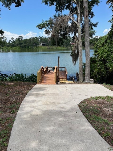 5054 Hammock Trl, Lake Park, GA 31636 - dock area with a boat ramp and a water view