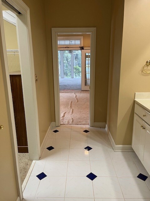 5054 Hammock Trl, Lake Park, GA 31636 - bathroom featuring vanity, baseboards, and tile patterned floors