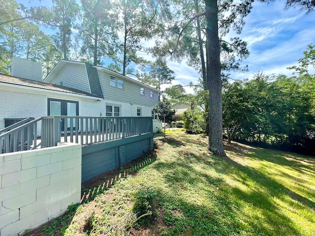 view of yard with a deck