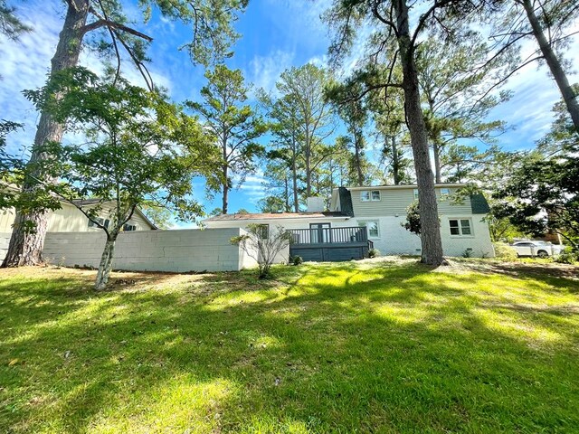 view of yard featuring a deck