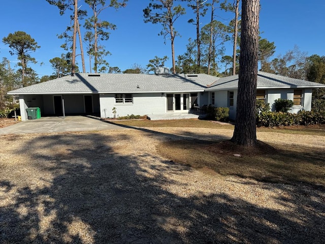 exterior space featuring a carport