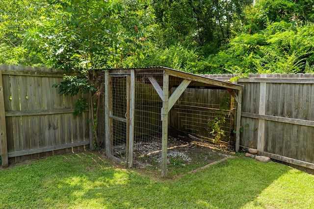 247 Harlee Ln, Ray City, GA 31645 - fenced backyard featuring exterior structure and an outbuilding