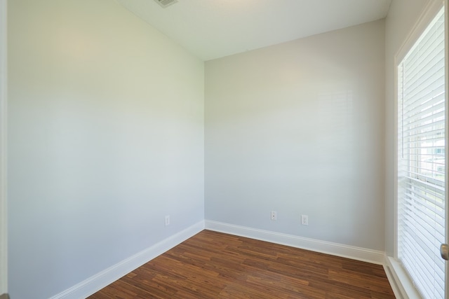 247 Harlee Ln, Ray City, GA 31645 - empty room with baseboards and dark wood finished floors