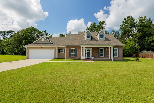 247 Harlee Ln, Ray City, GA 31645 - view of front facade with driveway, an attached garage, brick siding, and covered porch