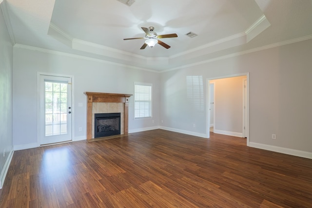 247 Harlee Ln, Ray City, GA 31645 - unfurnished living room featuring a raised ceiling, plenty of natural light, ceiling fan, and ornamental molding