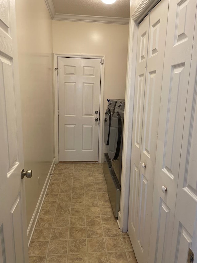 interior space with ornamental molding and independent washer and dryer