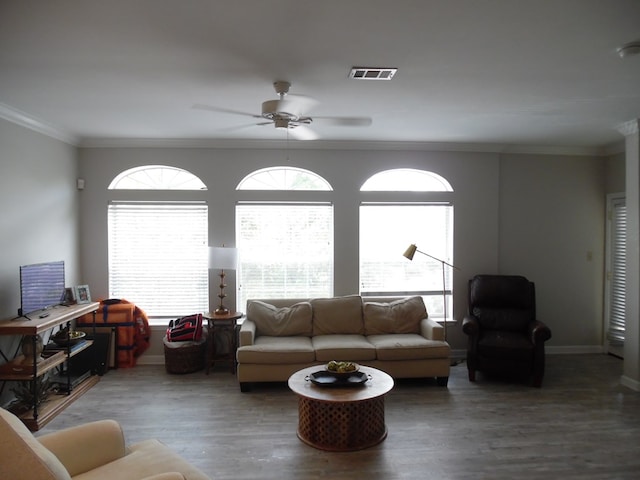 2502B Jerry Jones Dr Unit 3, Valdosta, GA 31602 - living room with ceiling fan, visible vents, crown molding, wood finished floors, and baseboards