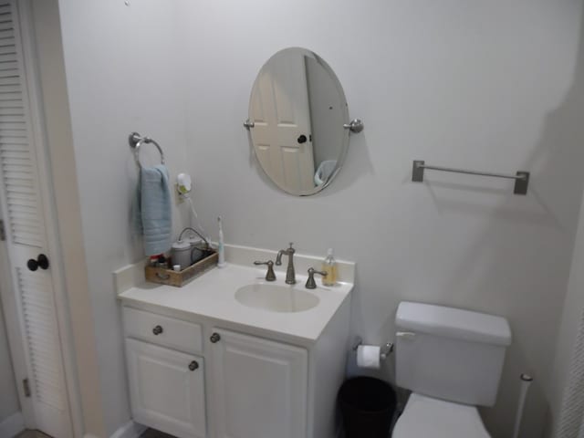 2502B Jerry Jones Dr Unit 3, Valdosta, GA 31602 - bathroom featuring toilet, a closet, and vanity