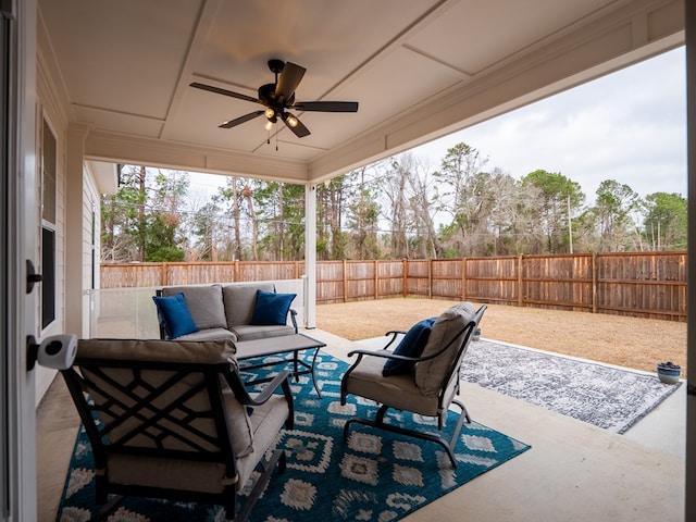 view of patio with outdoor lounge area and ceiling fan