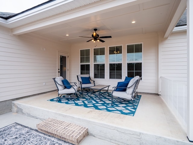 view of patio featuring ceiling fan