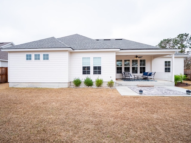 back of property with an outdoor hangout area, ceiling fan, and a patio area