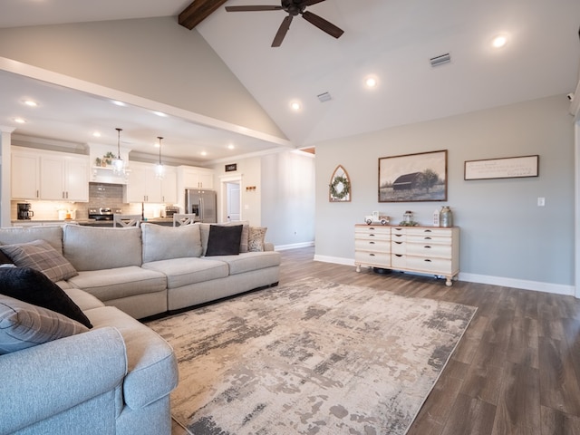 living room with beam ceiling, dark wood-type flooring, high vaulted ceiling, and ceiling fan