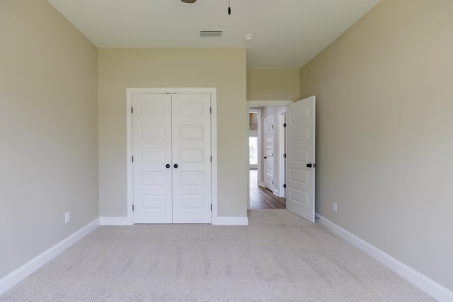 3061 Houser Way, Hahira, GA 31632 - unfurnished bedroom with carpet flooring, a closet, and baseboards