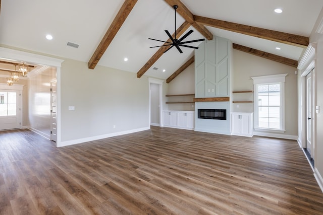 3061 Houser Way, Hahira, GA 31632 - unfurnished living room featuring a chandelier, healthy amount of natural light, a large fireplace, and baseboards