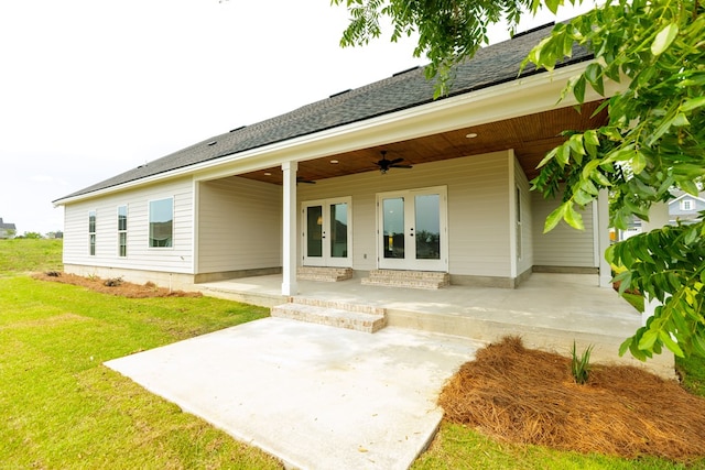 3061 Houser Way, Hahira, GA 31632 - back of property featuring french doors, ceiling fan, a yard, a patio area, and roof with shingles