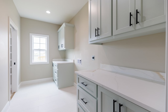 3061 Houser Way, Hahira, GA 31632 - laundry room with electric dryer hookup, cabinet space, hookup for a washing machine, baseboards, and recessed lighting