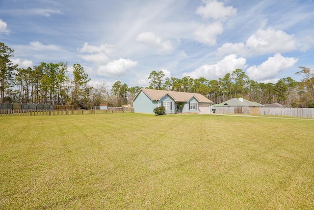 view of yard with fence