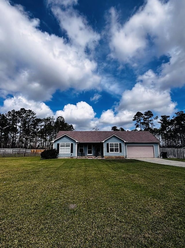 ranch-style home with a garage, driveway, a front yard, and fence