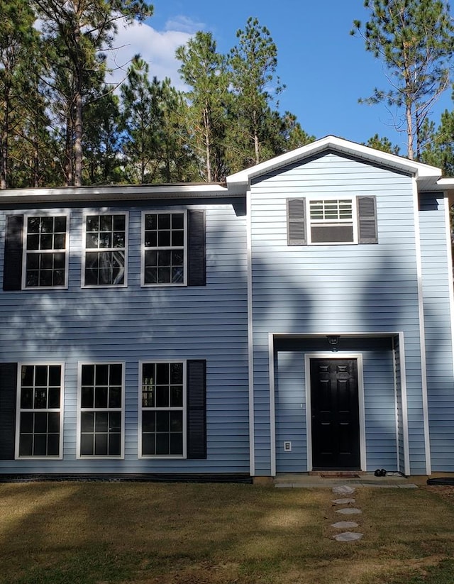 view of front facade with a front yard