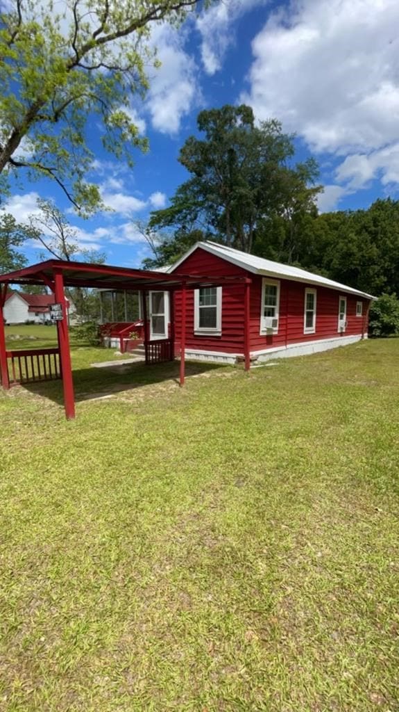 exterior space featuring a yard