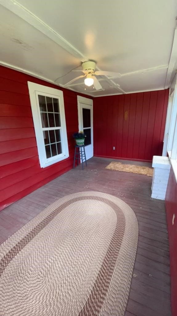 wooden terrace with ceiling fan