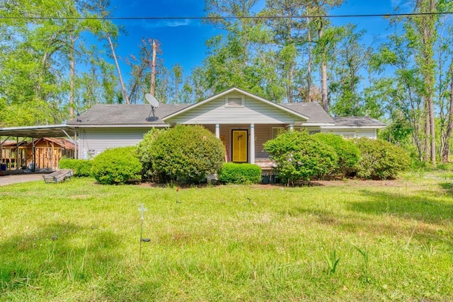 505 Myddleton Rd, Valdosta, GA 31601 - ranch-style home with a porch, driveway, a front yard, and a carport