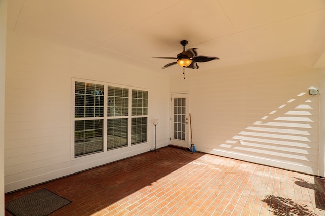 view of patio featuring ceiling fan