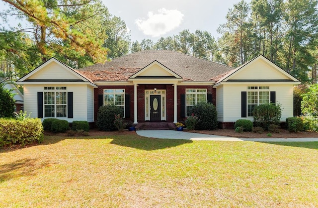 single story home with a front yard