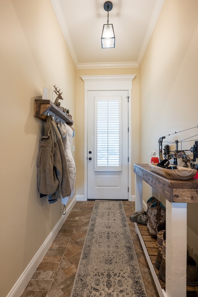 entryway featuring crown molding