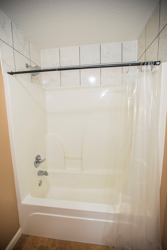 bathroom featuring shower / bath combo