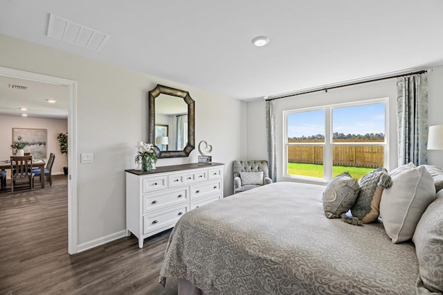 bedroom featuring dark wood-style floors, recessed lighting, visible vents, and baseboards