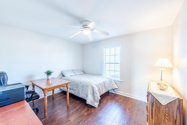 bedroom featuring ceiling fan and dark wood-type flooring