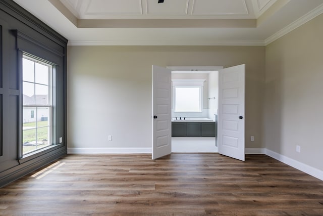 4856 Brown Cat Cir, Hahira, GA 31632 - unfurnished bedroom featuring crown molding, dark wood-type flooring, and ensuite bathroom
