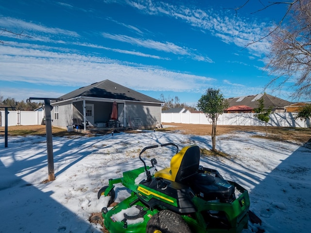 view of yard covered in snow