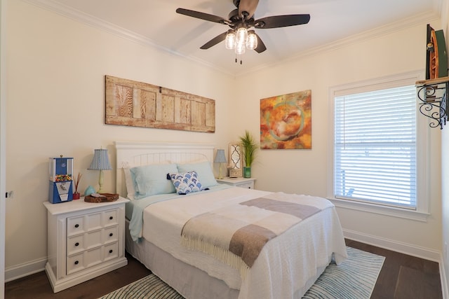 bedroom featuring ceiling fan, dark hardwood / wood-style flooring, and crown molding