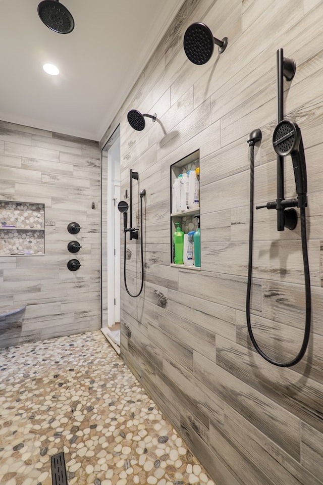 bathroom with tiled shower