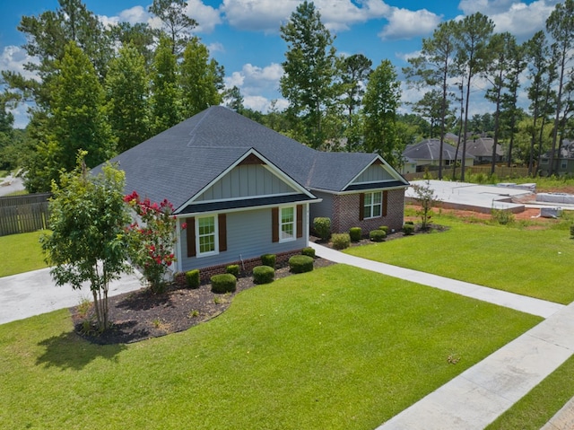4234 Whithorn Way, Valdosta, GA 31605 - view of front facade with a shingled roof and board and batten siding
