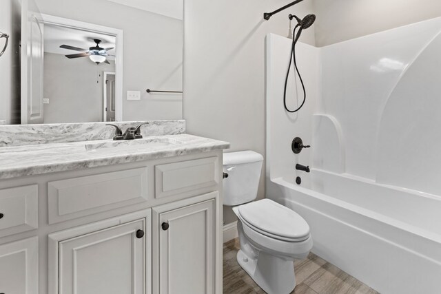 4234 Whithorn Way, Valdosta, GA 31605 - full bath with vanity, ceiling fan, shower / bathtub combination, and wood finished floors