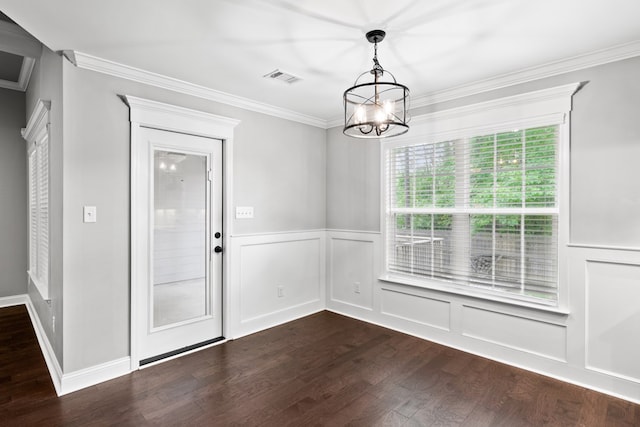 4234 Whithorn Way, Valdosta, GA 31605 - unfurnished dining area with dark wood-style floors, a chandelier, ornamental molding, a wainscoted wall, and a decorative wall