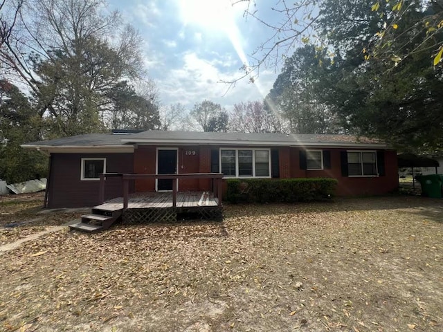 view of front of house featuring a deck