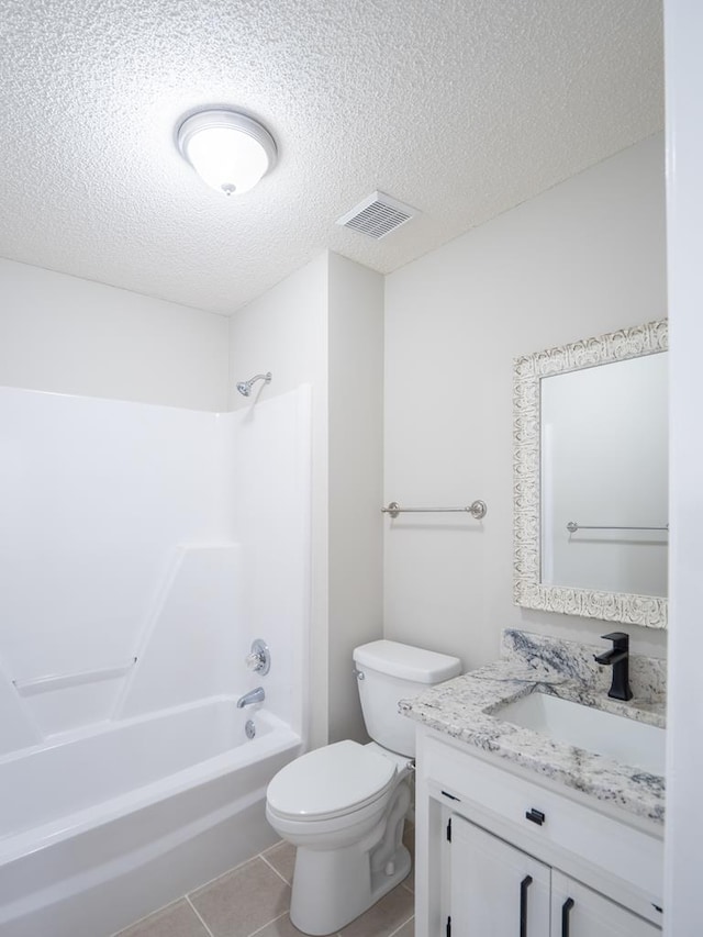 3875 Studstill Rd, Valdosta, GA 31605 - full bathroom featuring a textured ceiling, toilet, vanity, shower / tub combination, and tile patterned floors
