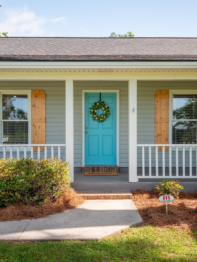 3875 Studstill Rd, Valdosta, GA 31605 - property entrance featuring covered porch and a shingled roof
