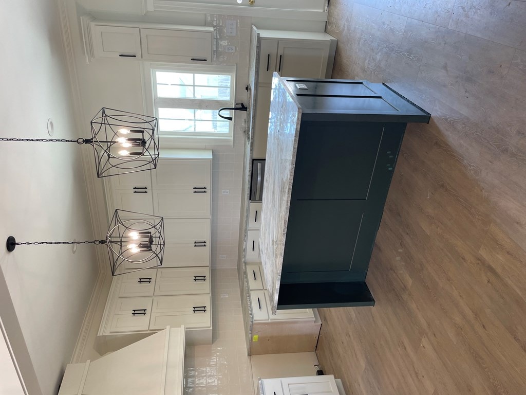 kitchen with white cabinetry