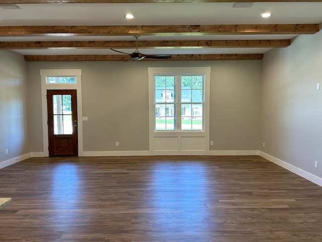 unfurnished room featuring ceiling fan, beam ceiling, and dark wood-type flooring