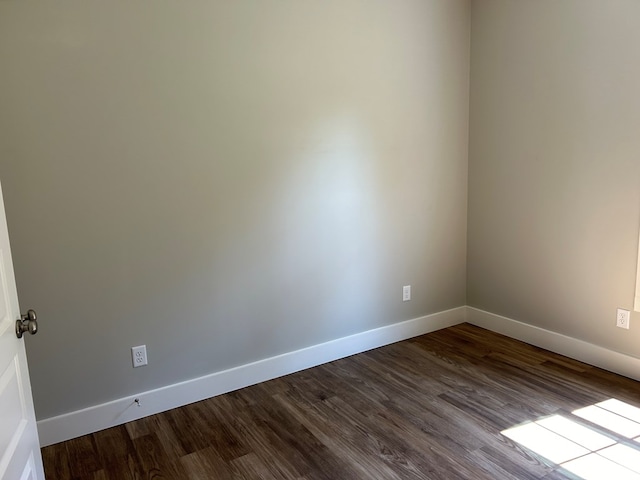 empty room featuring hardwood / wood-style floors