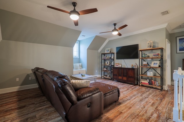 living room with hardwood / wood-style floors, vaulted ceiling, ceiling fan, and crown molding