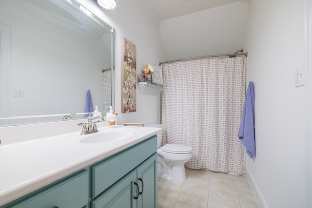 bathroom featuring tile patterned floors, vanity, and toilet